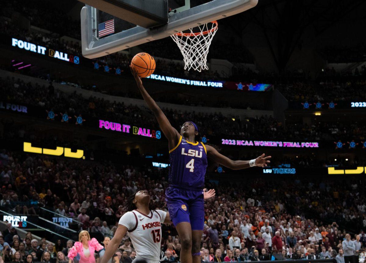 LSU women&#8217;s basketball freshman guard Flau'jae Johnson (4) attempts a layup on Friday, March 31, 2023, during LSU&#8217;s 79-72 victory over Virginia Tech in the NCAA Final Four in the American Airlines Center in Dallas, Texas.