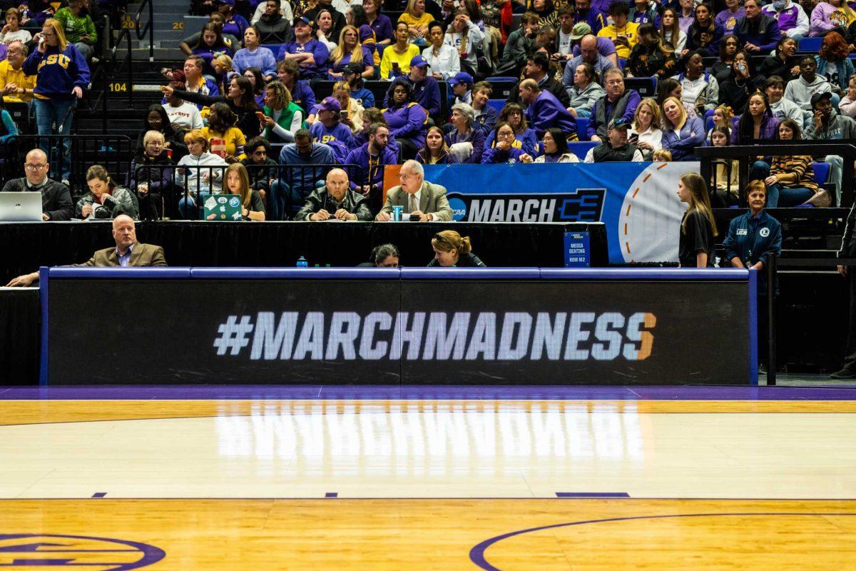 The March Madness sign sits on the court Sunday, March 19, 2023, at the Pete Maravich Assembly Center on N. Stadium Drive in Baton Rouge, La.