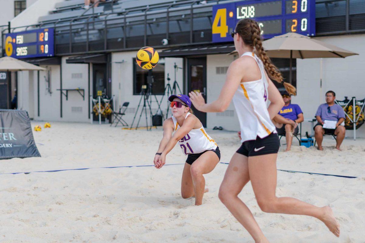 <p>LSU beach volleyball sophomore Cassidy Chambers (21) receives the serve on Saturday, March 25, 2023, during LSU’s 4-1 win against Texas A&M-Corpus Christi at the LSU beach volleyball stadium on Cypress Drive.</p>