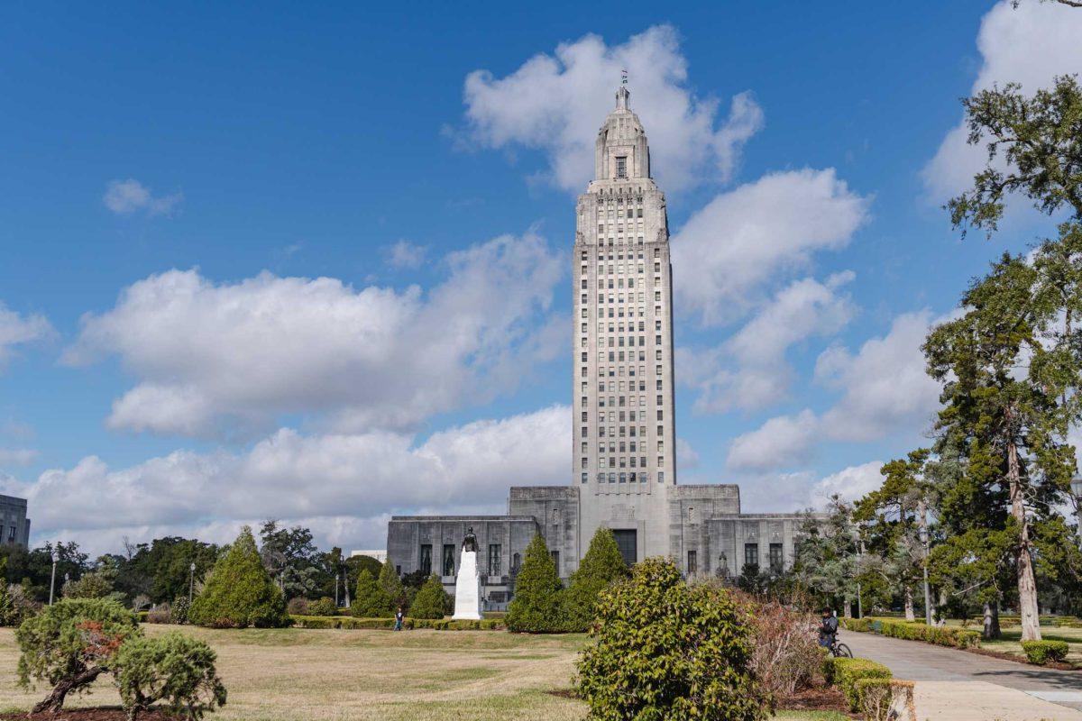 The Louisiana State Capitol climbs into the clouds on Sunday, Jan. 22, 2023, on North Third Street in Baton Rouge, La.