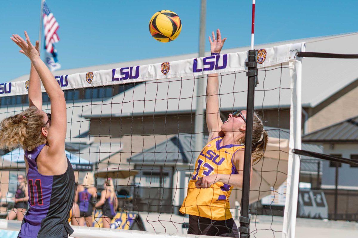 LSU beach volleyball junior Lara Boos (33) leaps up for the ball on Sunday, March 27, 2022, during LSU&#8217;s 1-4 loss against TCU at the Beach Volleyball Stadium on Cypress Drive in Baton Rouge, La.