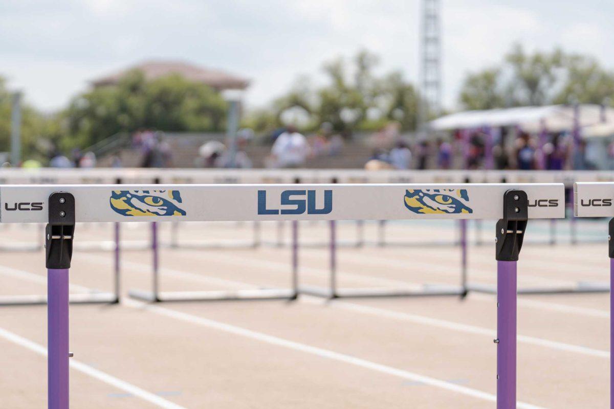 LSU hurdles sit on the track before the race on Saturday, March 25, 2023, during the Battle on the Bayou track meet at the Bernie Moore Track Stadium in Baton Rouge, La.