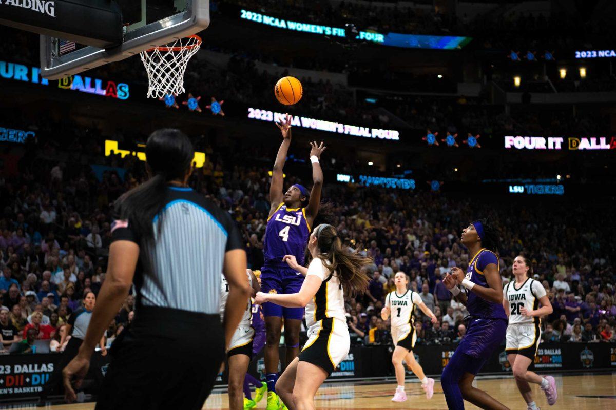 LSU women's basketball freshman guard Flau'jae Johnson (4) shoots on Sunday, April 2, 2023, during LSU's 102-85 win against Iowa in the NCAA National Championship in the American Airlines Center in Dallas, Texas.