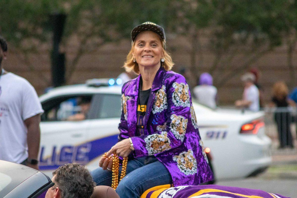 LSU women's basketball head coach Kim Mulkey smiles at the fans on Wednesday, April 5, 2023, during the women's basketball championship parade on LSU's campus.