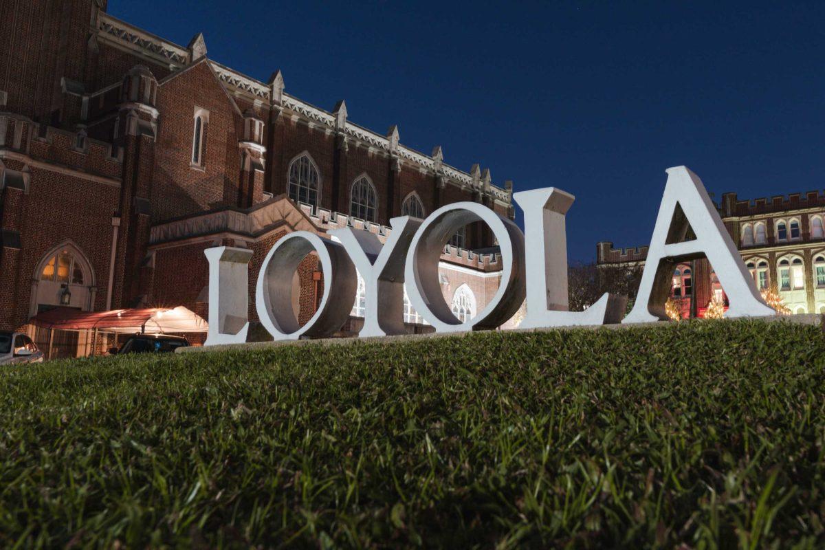 The Loyola sign sits atop a small mound on Thursday, Dec. 15, 2022, on St. Charles Avenue in New Orleans, La.