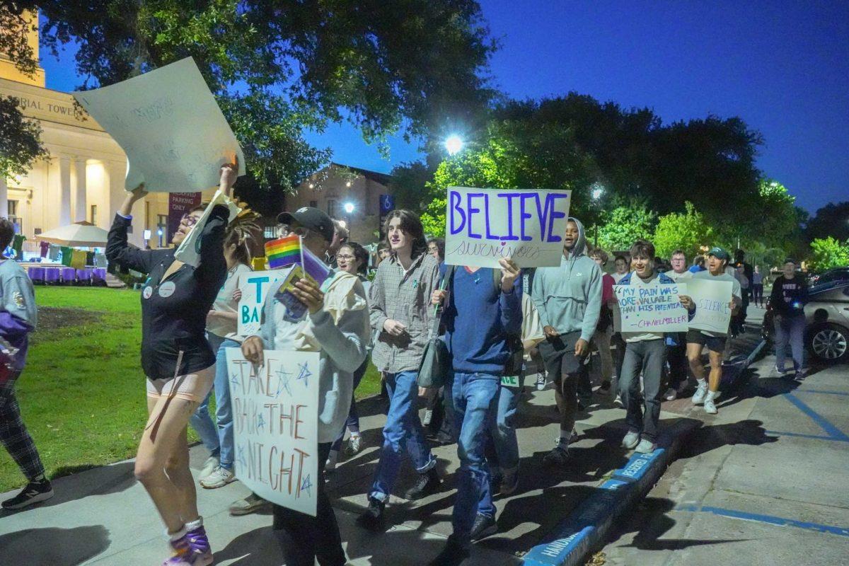 FIA's Take Back the Night participants march for empowerment against sexual assault Monday, April 24, 2023, on Tower Dr. in Baton Rouge, La.