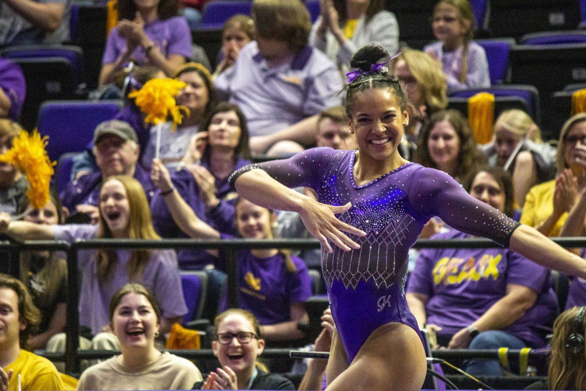 LSU gymnastics all-around junior Haleigh Bryant smiles through her floor exercise routine Friday, March 10, 2023, during LSU's 198.025-196.450 victory over West Virginia in the Pete Maravich Assembly Center in Baton Rouge, La.