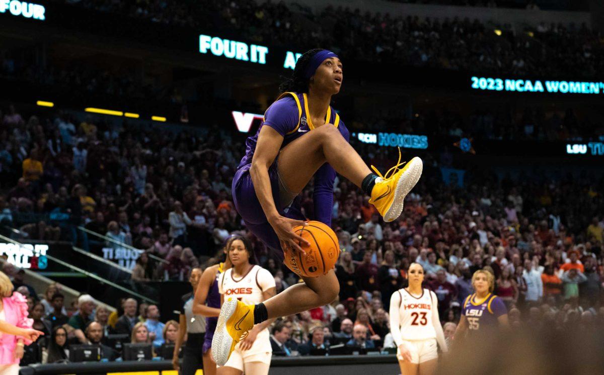 LSU women&#8217;s basketball 5th-year-senior Alexis Morris (45) shows off for the crowd on Friday, March 31, 2023, during LSU&#8217;s 79-72 victory over Virginia Tech in the NCAA Final Four in the American Airlines Center in Dallas, Texas.