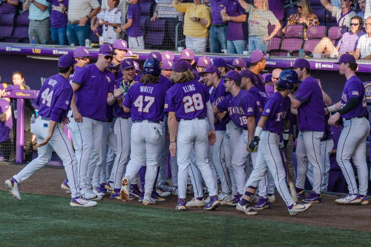 The LSU baseball team celebrates sophomore third baseman Tommy White&#8217;s (47) home run on Friday, April 28, 2023, during LSU&#8217;s 8-6 win over Alabama at Alex Box Stadium in Baton Rouge, La.