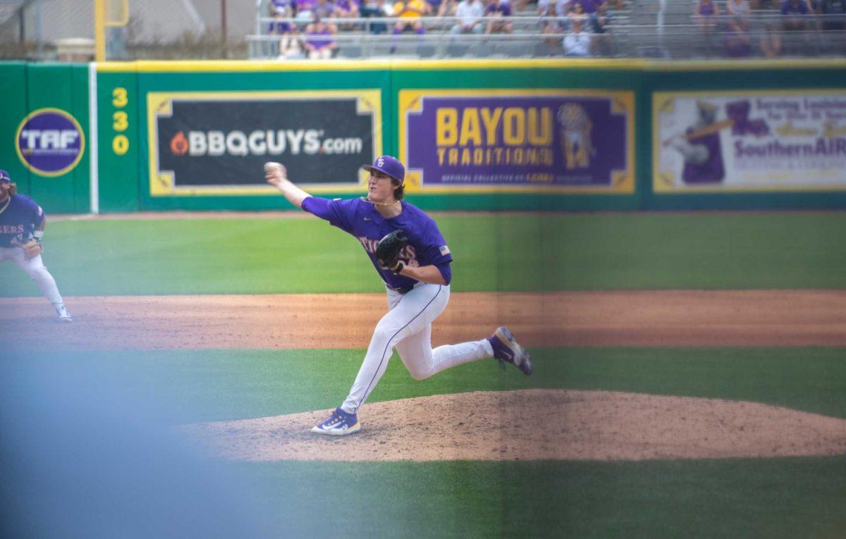 LSU baseball freshman right-handed pitcher Chase Shores (34) pitches the ball on Friday, March 24, 2023, during LSU's 3-9 loss against Arkansas in Alex Box Stadium in Baton Rouge, La.