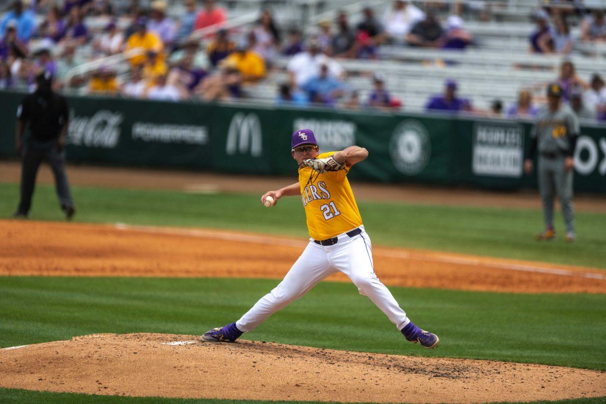 LSU baseball redshirt sophomore red-handed pitcher Bryce Collins (21) makes a pitch Saturday, April 23, 2022, during LSU's 8-6 win over Missouri at Alex Box Stadium.