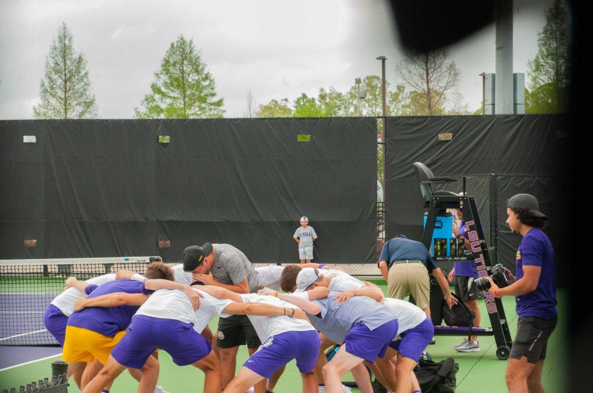 The men's tennis team hypes each other up before their 5-2 loss against UGA Friday, March 24, 2023 at the LSU Tennis Complex in Baton Rouge.