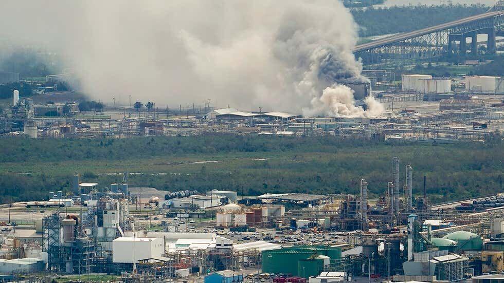 A chemical fire burns at a facility during the aftermath of Hurricane Laura on Thursday, Aug. 27, 2020, near Lake Charles, La.