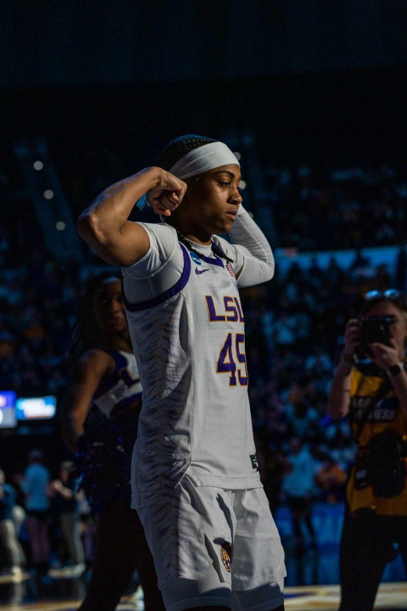 LSU women's basketball 5th-year senior guard Alexis Morris (45) flexes during the second round of March Madness Sunday, March 19, 2023, at the Pete Maravich Assembly Center on N. Stadium Drive in Baton Rouge, La.