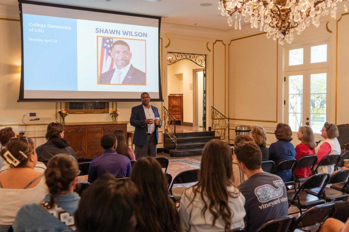 Gubernatorial candidate and former State Transportation Secretary Shawn Wilson opens the town hall by speaking about himself on Monday, April 24, 2023, inside the French House on LSU&#8217;s campus in Baton Rouge, La.