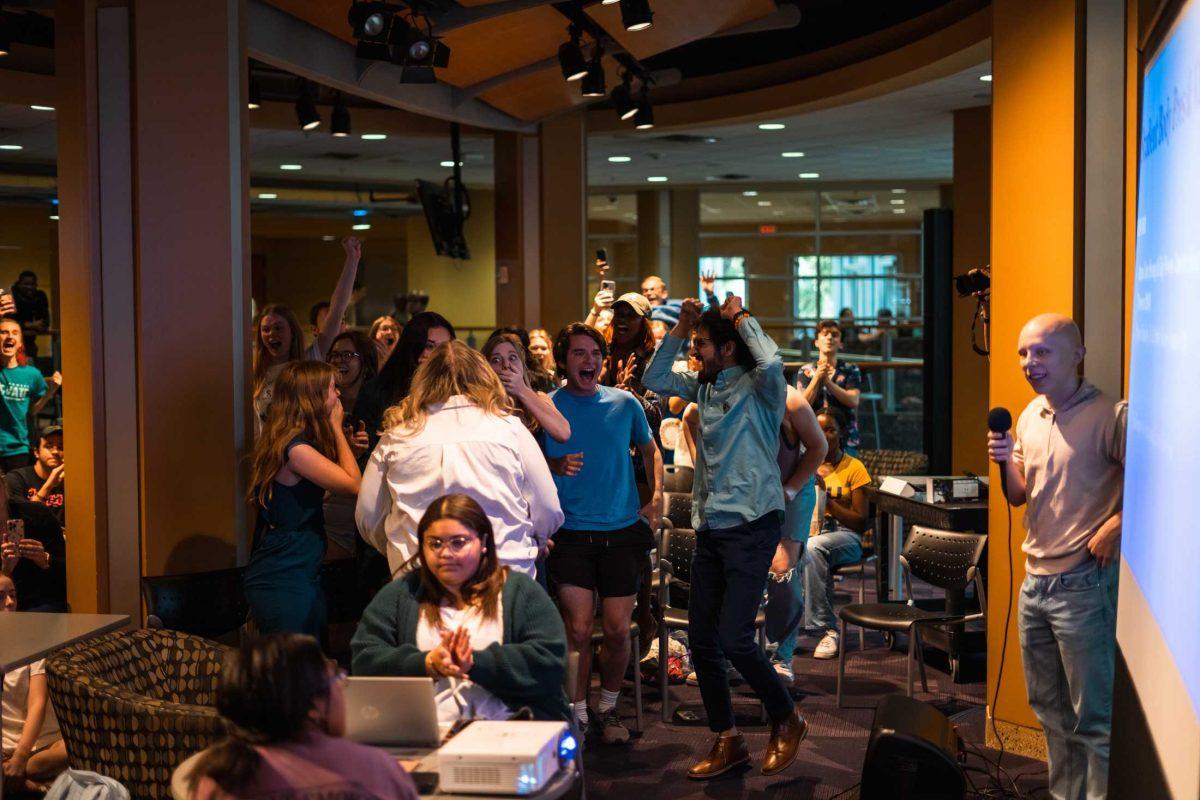 LSU student government members celebrate Innovate's win Wednesday, April 5, 2023, at the LSU Student Union in Baton Rouge, La.