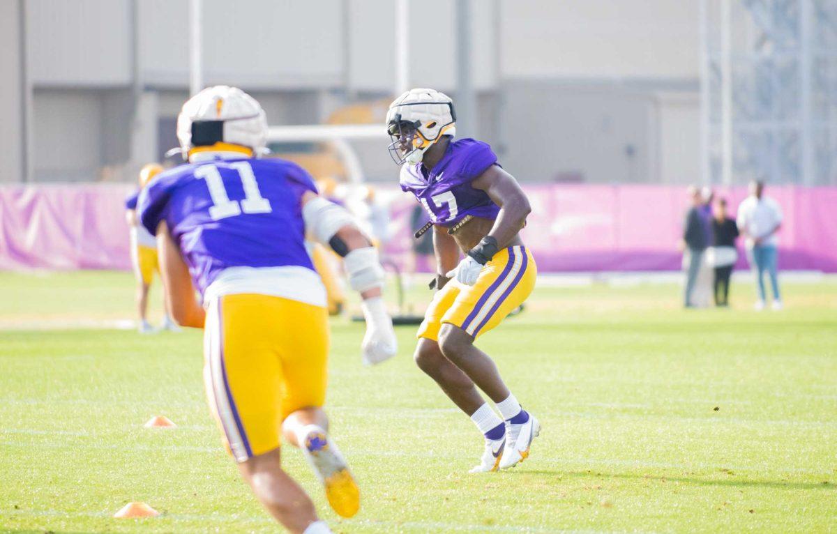 LSU football senior defensive end Ovie Oghoufo (17) runs a defense drill on Tuesday, April 18, 2023, at the Charles McClendon Practice Facility in Baton Rouge, La.