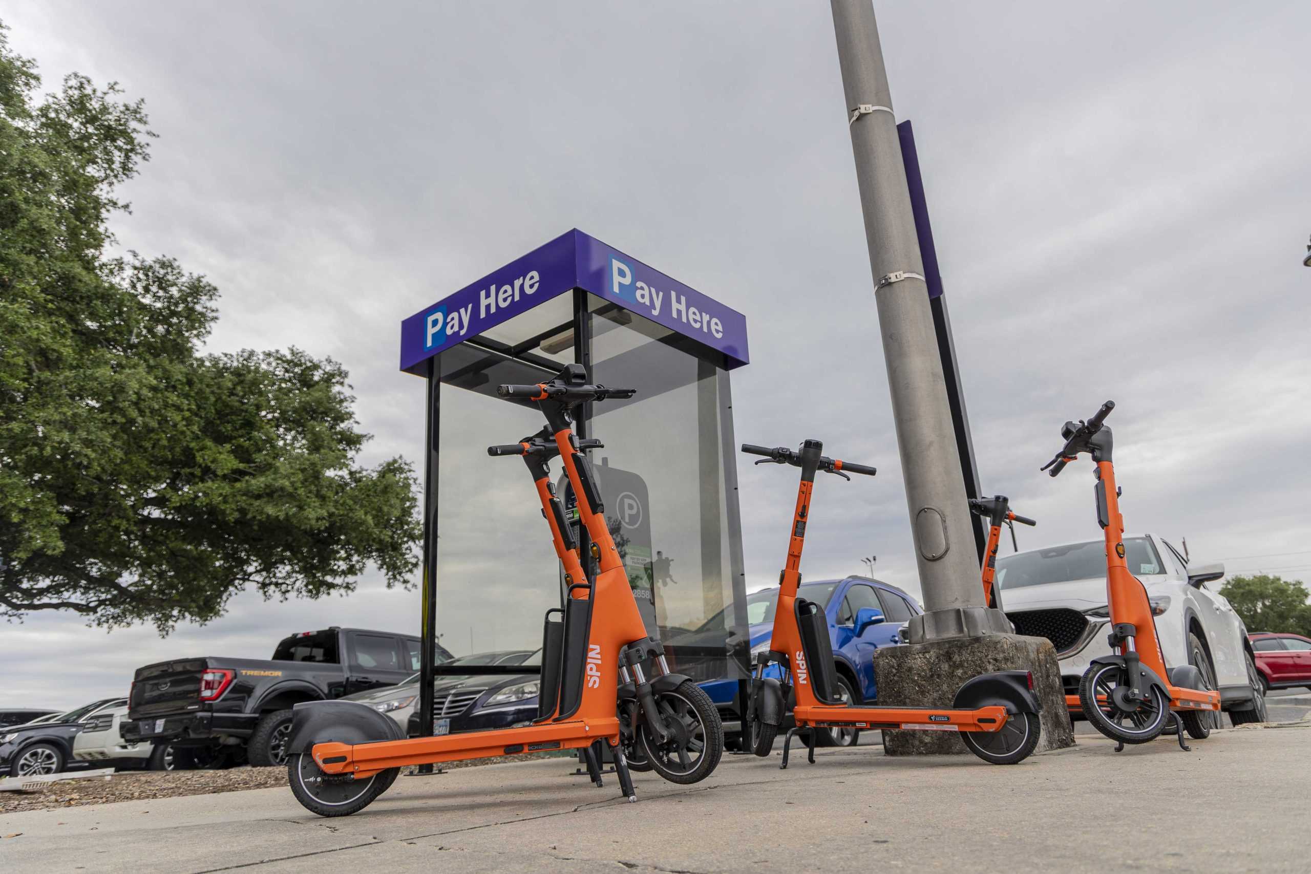 Quick Takes: What's the deal with those bright orange scooters all over campus?