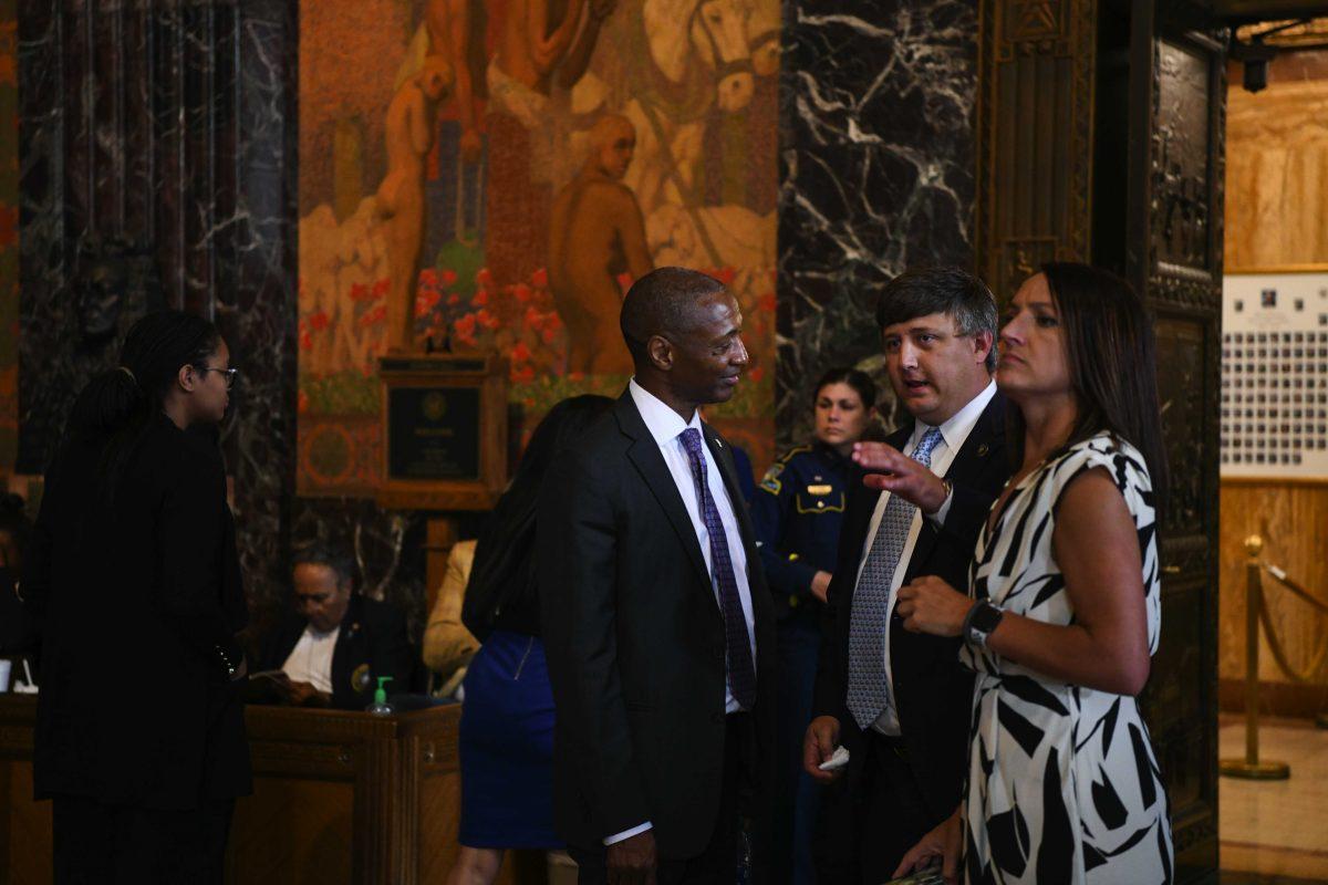 LSU President William F. Tate speaks with Senator Stewart Cathey Jr. Wednesday, April 20, 2022, during the annual LSU Day at the Capitol at the Louisiana State Capitol in Baton Rouge, La.