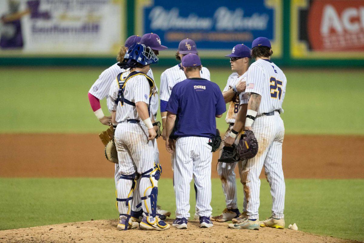 LSU baseball head coach Jay Johnson talks to his players during a mound visit Tuesday, May 16, 2023, during LSU&#8217;s 7-4 win against McNeese State University at Alex Box Stadium in Baton Rouge, La.