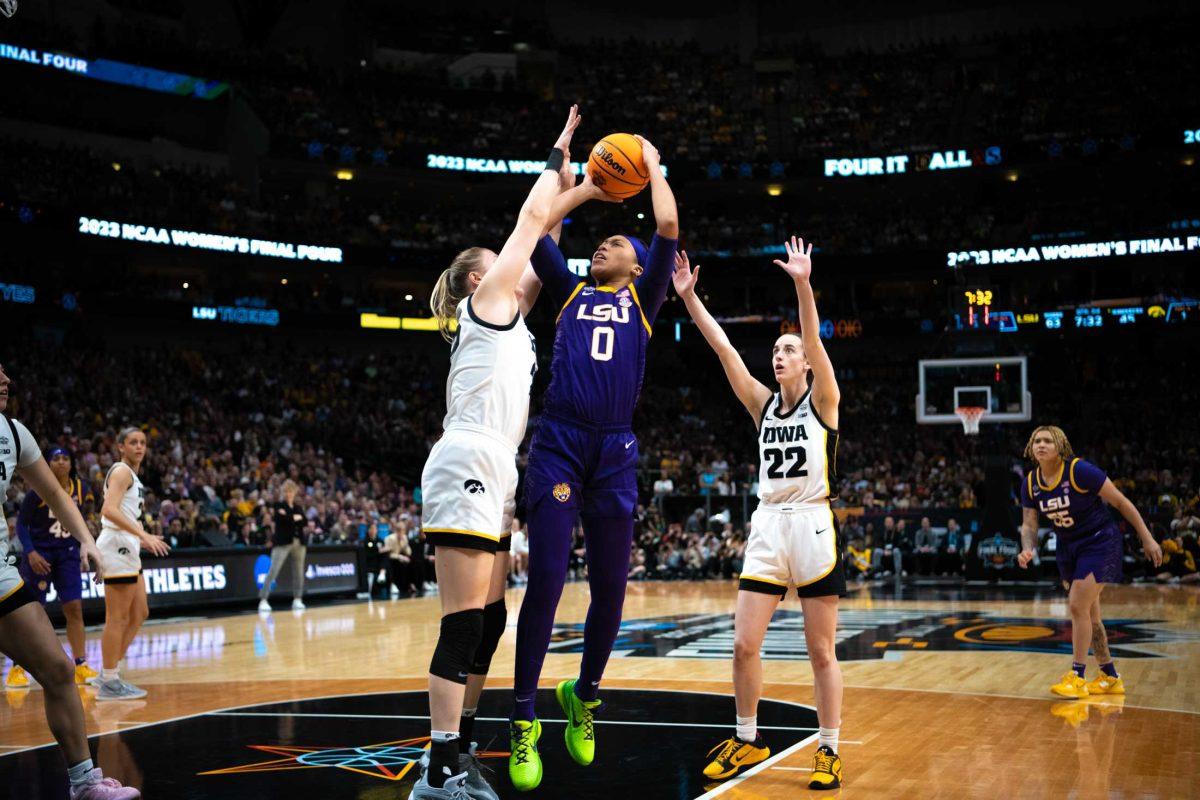 LSU women&#8217;s basketball graduate student forward LaDazhia Williams (0) attempts the shot on Sunday, April 2, 2023, during LSU's 102-85 win against Iowa in the NCAA National Championship in the American Airlines Center in Dallas, Texas.