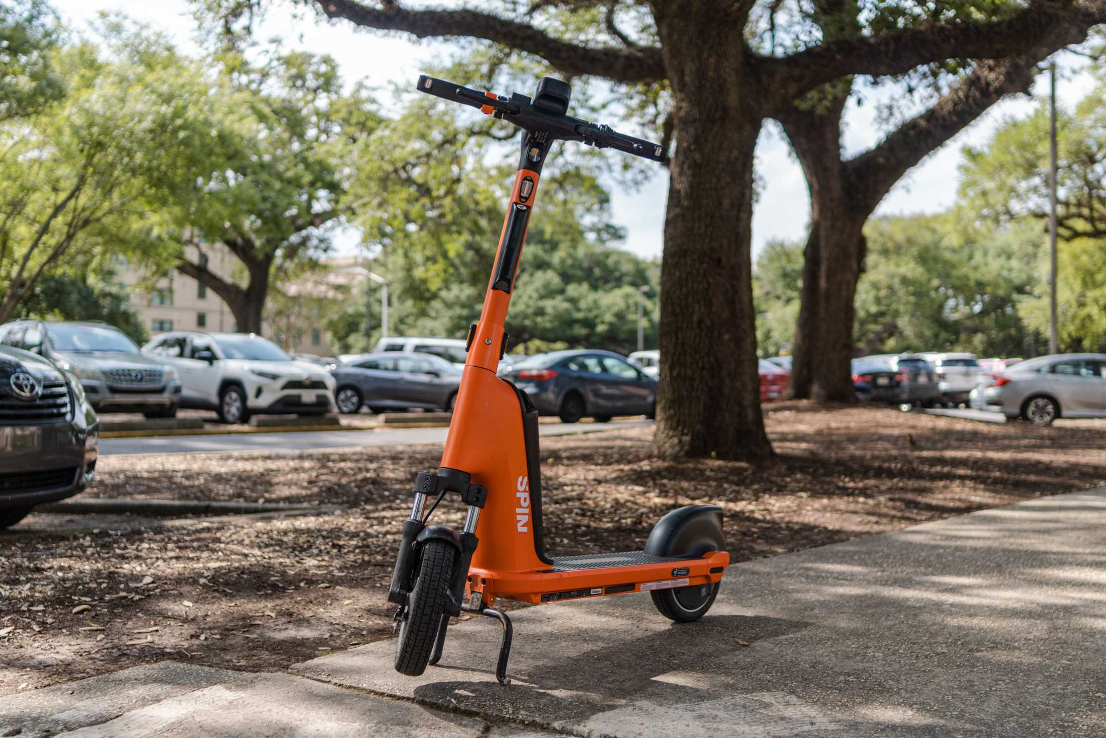 Quick Takes: What's the deal with those bright orange scooters all over campus?