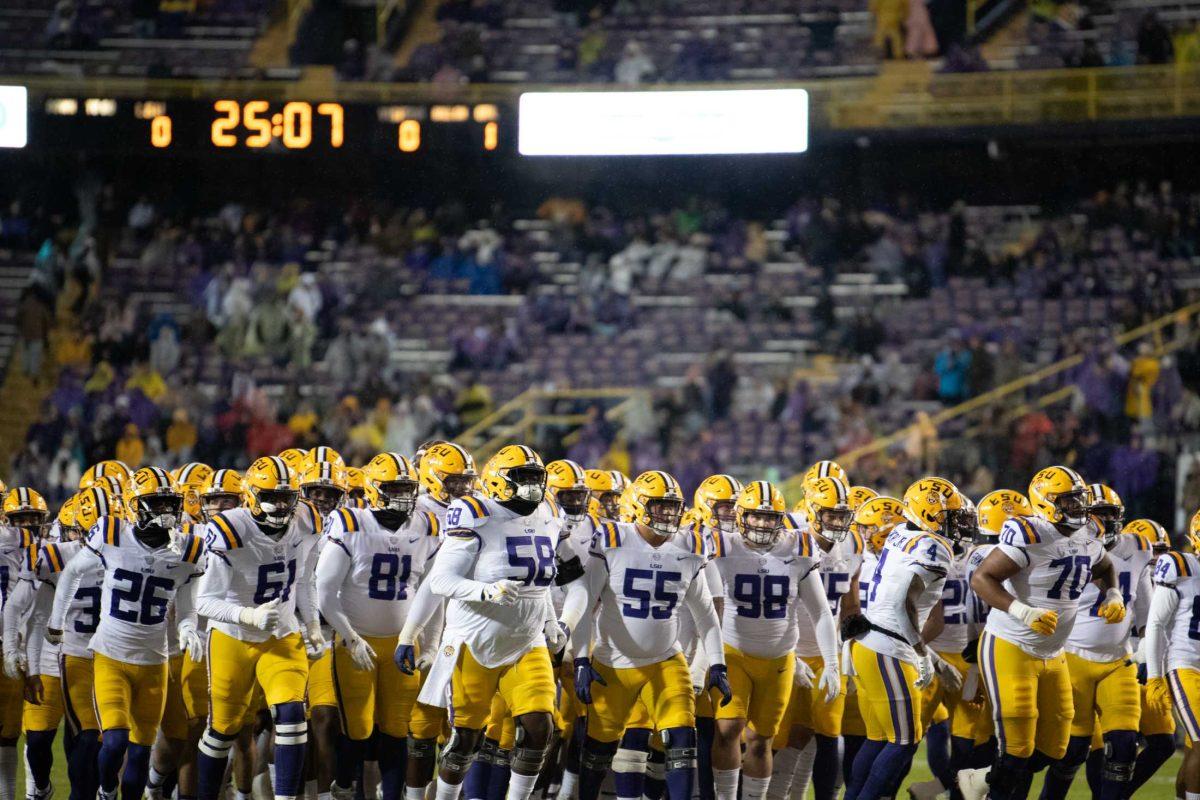 The LSU football team runs into the tunnel before the start of the game against UAB on Saturday, Nov. 19, 2022, in Tiger Stadium in Baton Rouge, La.