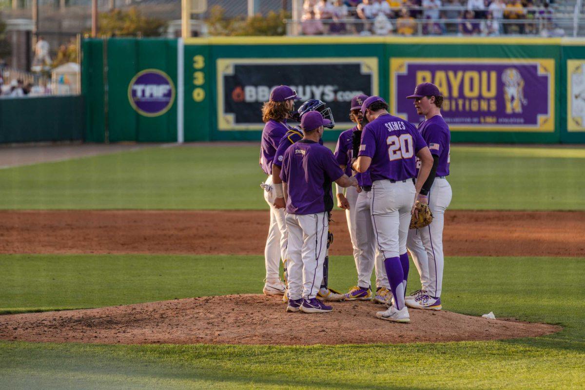 The LSU baseball team meets on the mound on Friday, April 28, 2023, during LSU&#8217;s 8-6 win over Alabama at Alex Box Stadium in Baton Rouge, La.