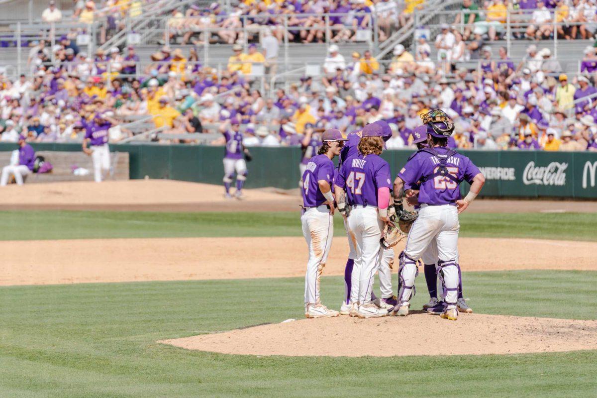 The LSU baseball team meets on the mound Friday, June 2, 2023, during LSU&#8217;s 7-2 victory against Tulane at Alex Box Stadium in Baton Rouge, La.