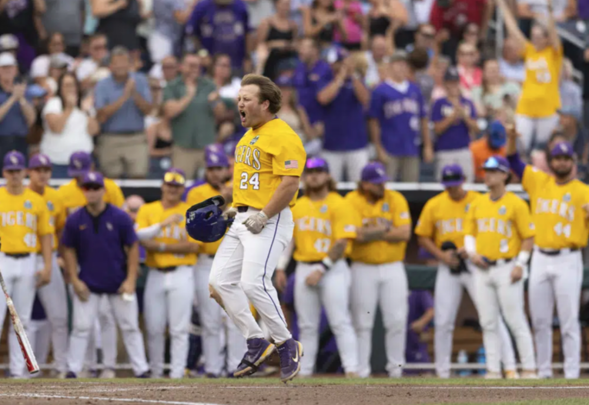 LSU's Cade Beloso celebrates as he approaches home plate after hitting a three-run home run against Wake Forest during the third inning of a baseball game at the NCAA College World Series in Omaha, Neb., Wednesday, June 21, 2023. (AP Photo/Rebecca S. Gratz)