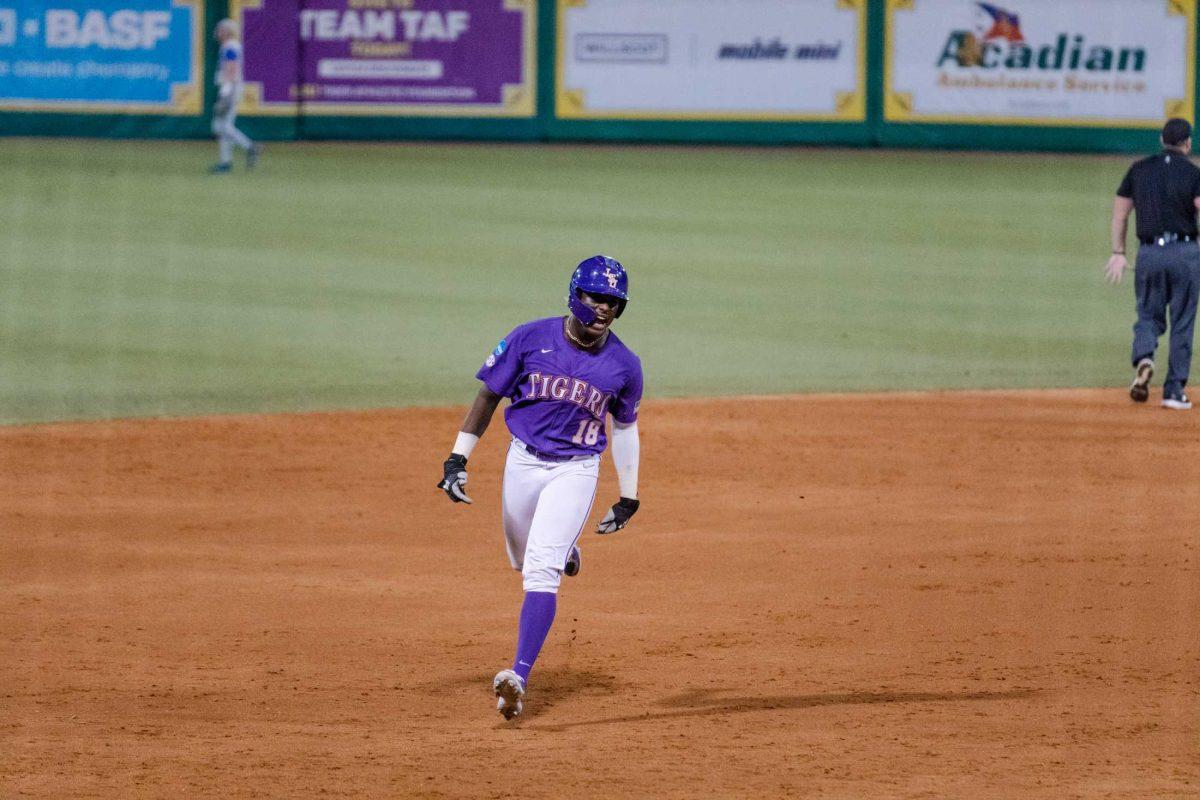 LSU baseball junior first baseman Tre&#8217; Morgan (18) runs the bases after hitting a home run Saturday, June 10, 2023, during LSU&#8217;s 14-0 win against Kentucky at Alex Box Stadium in Baton Rouge, La.