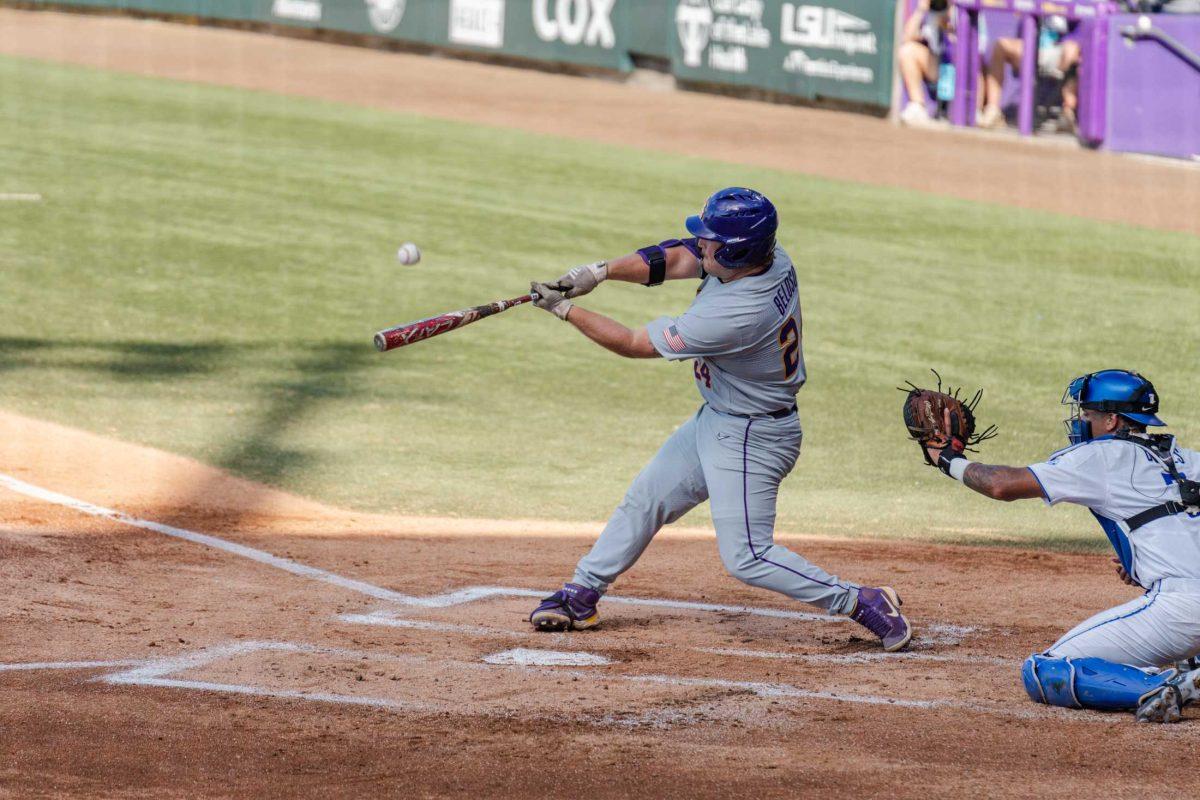 LSU baseball graduate student designated hitter Cade Beloso (24) sends the ball flying Sunday, June 11, 2023, during LSU&#8217;s 8-3 win against Kentucky at Alex Box Stadium in Baton Rouge, La.