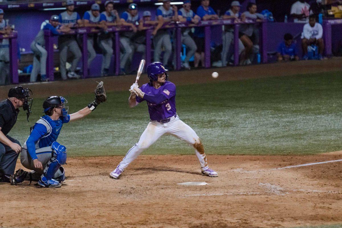 LSU baseball junior outfielder Dylan Crews (3) watches the ball Saturday, June 10, 2023, during LSU&#8217;s 14-0 win against Kentucky at Alex Box Stadium in Baton Rouge, La.