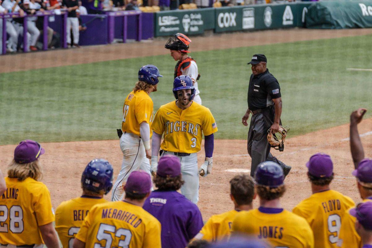 LSU baseball junior outfielder Dylan Crews (3) celebrates a home run Monday, June 5, 2023, during LSU&#8217;s 13-7 win against Oregon state in Alex Box Stadium in Baton Rouge, La.