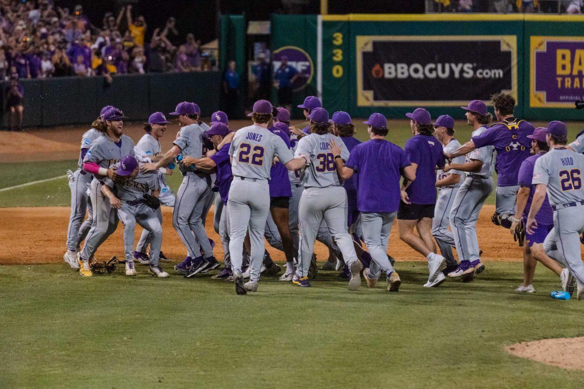 The LSU baseball team celebrates on the field Sunday, June 11, 2023, after LSU&#8217;s 8-3 win against Kentucky at Alex Box Stadium in Baton Rouge, La.