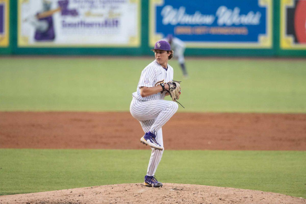 LSU baseball freshman pitcher Griffin Herring (35) winds up Tuesday, May 16, 2023, during LSU&#8217;s 7-4 win against McNeese Statue University at Alex Box Stadium in Baton Rouge, La.