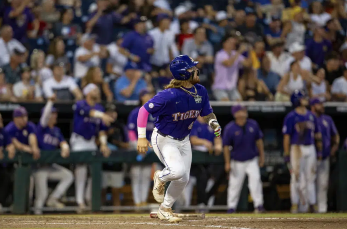 LSU's Tommy White watches his game-winning home run against Wake Forest during the 11th inning of a baseball game at the NCAA College World Series in Omaha, Neb., Thursday, June 22, 2023. (AP Photo/John Peterson)