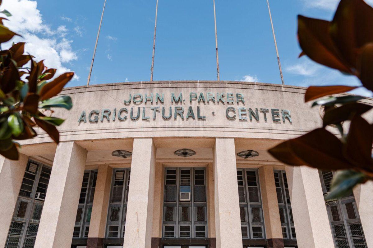 Leaves frame the John M. Parker Agricultural Center on Friday, July 7, 2023, near Highland Road in Baton Rouge, La.