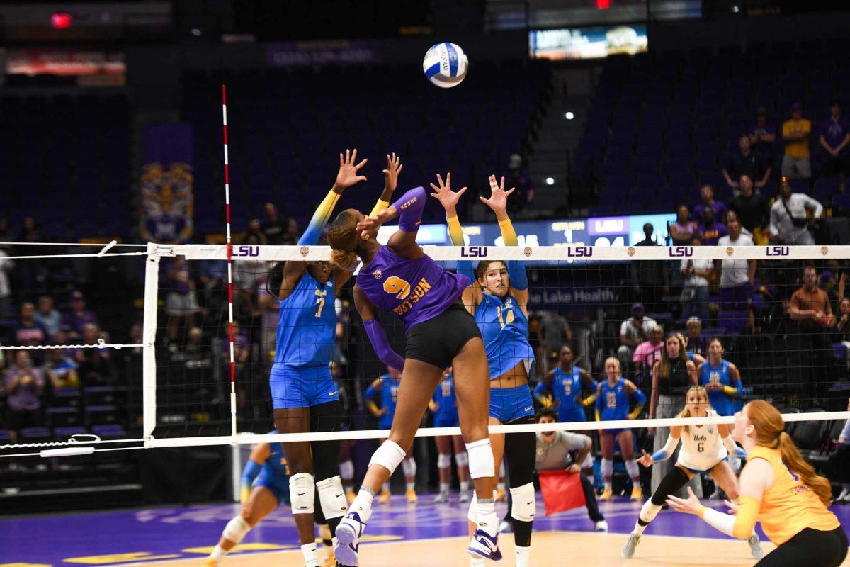 LSU volleyball graduate student outside hitter Sanaa Dotson (9) hits the ball on Friday, Aug. 25, 2023, during LSU&#8217;s 3-2 win against UCLA in the Pete Maravich Assembly Center in Baton Rouge, La.