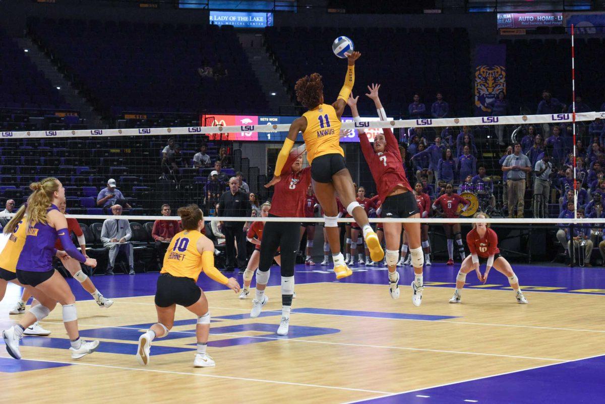 LSU senior Anita Anwusi hits the ball over the net on Wednesday, Sept. 21, 2022, during LSU&#8217;s 3-2 win over Arkansas at the Pete Maravich Assembly Center in Baton Rouge, La.