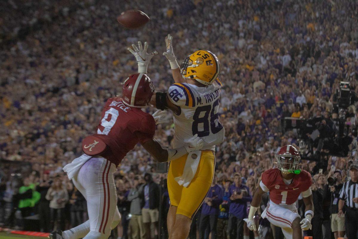 LSU football freshman tight end Mason Taylor (86) reaches for the ball to make a touchdown on Saturday, Nov. 5, 2022, during LSU&#8217;s 32-31 victory over Alabama in Tiger Stadium in Baton Rouge, La.