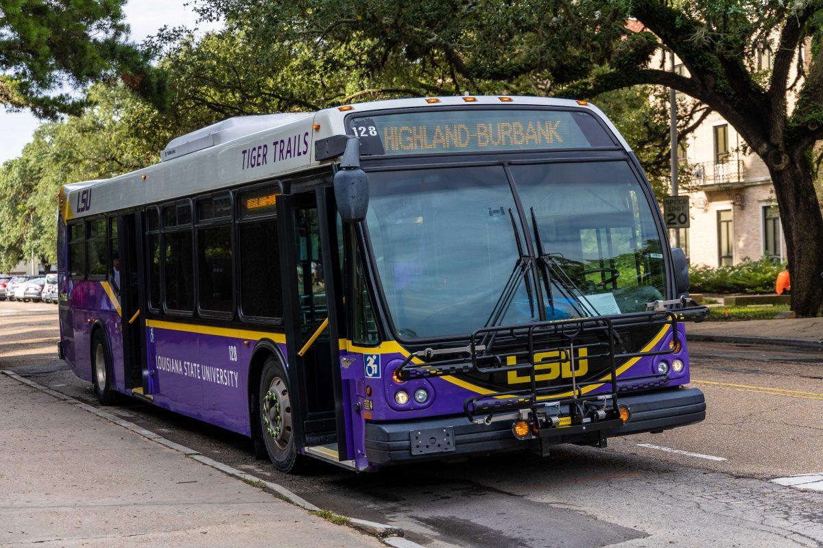 A bus sits in the shade Thursday, Aug. 25, 2022, on Field House Drive.