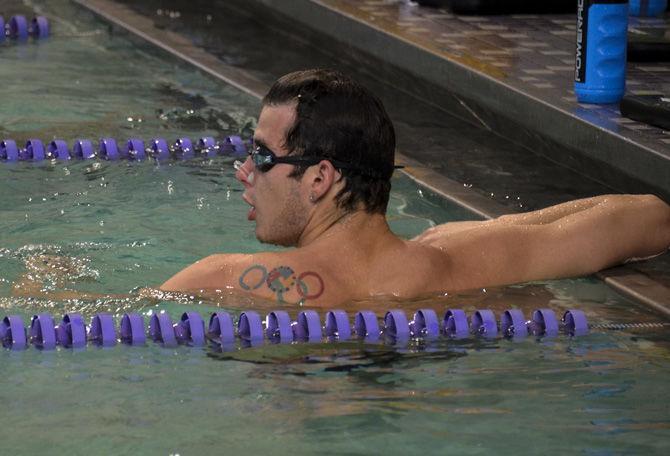 LSU sophomore swimmer Matt Klotz takes a break during practice on Tuesday, Aug. 29, 2017, at the UREC.