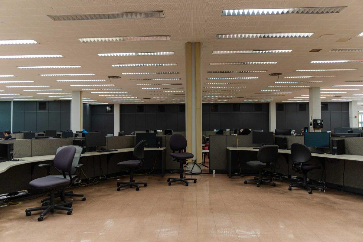 Computers sit on desks on Thursday, April 13, 2023, inside the LSU Library on LSU&#8217;s campus in Baton Rouge, La.