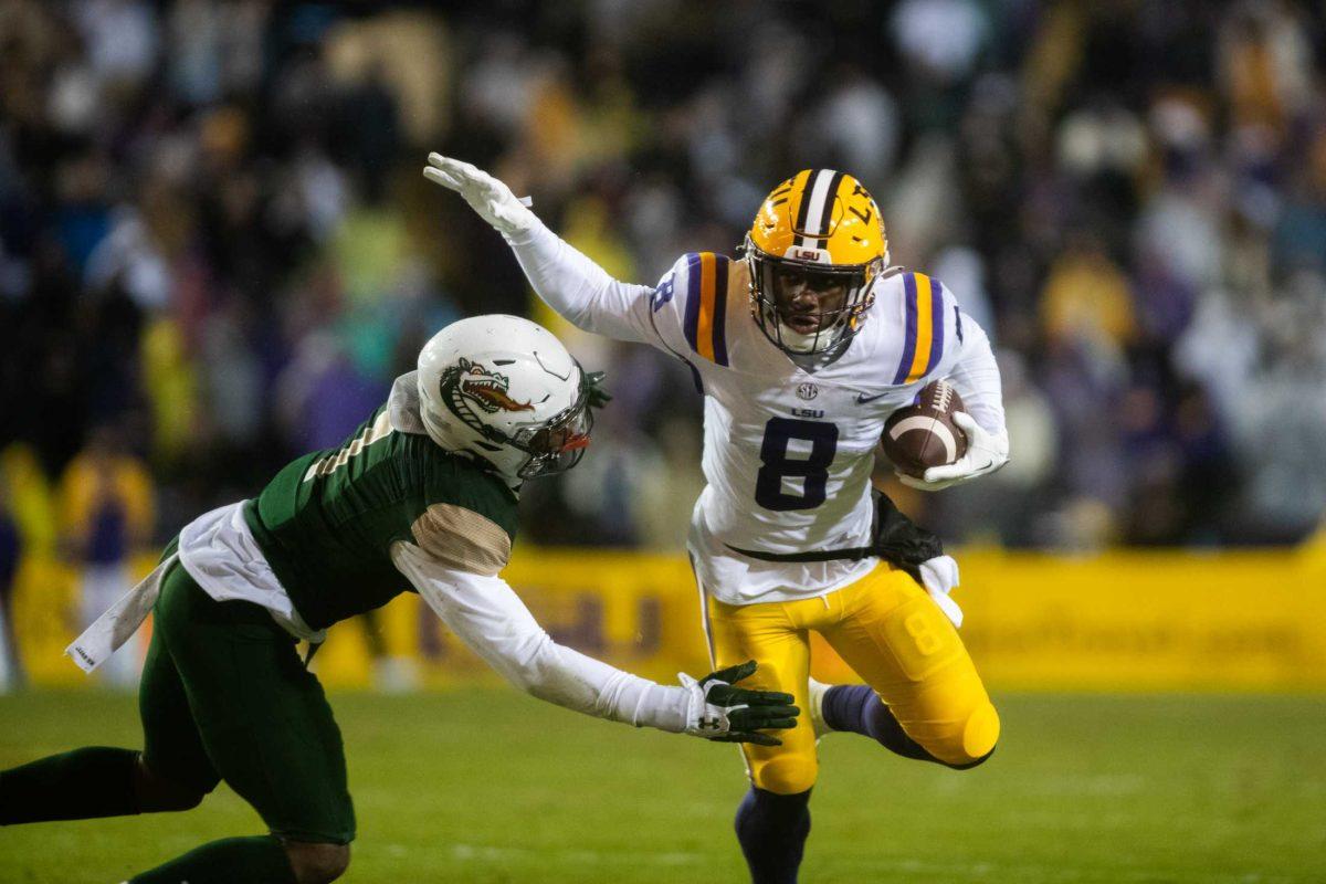 LSU sophomore wide receiver Malik Nabers (8) runs with the ball during LSU&#8217;s 41-10 win against the UAB Blazers on Saturday, Nov. 19, 2022, in Tiger Stadium.