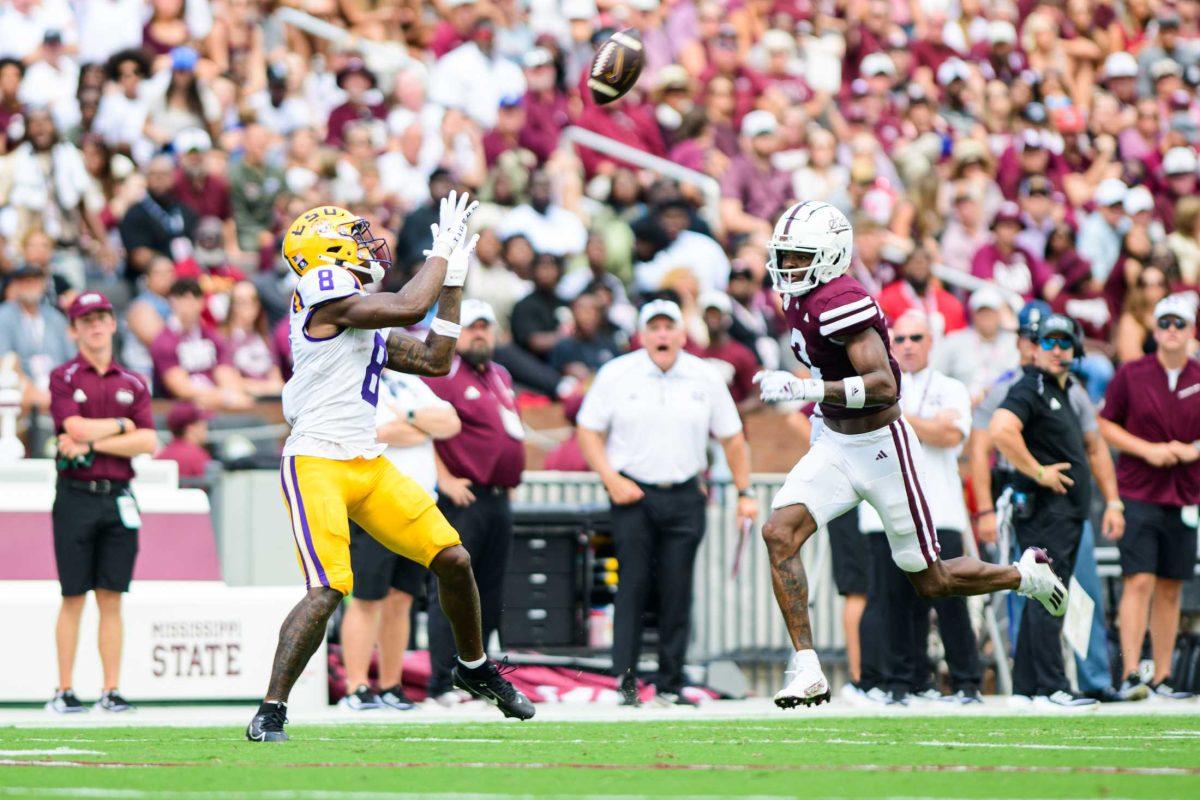 LSU football junior wide receiver Malik Nabers (8) reaches to receive the pass on Saturday, Sept. 16, 2023, during LSU's 41-14 win over Mississippi State in Davis Wade Stadium in Starkville, MS.