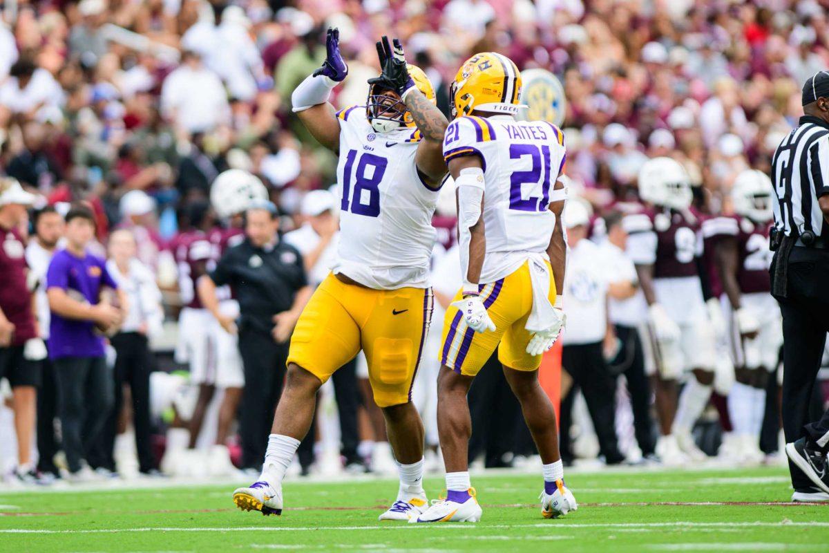 LSU football junior defensive tackle Mekhi Wingo (18) celebrates a sack on Saturday, Sept. 16, 2023, during LSU's 41-14 win over Mississippi State in Davis Wade Stadium in Starkville, MS.