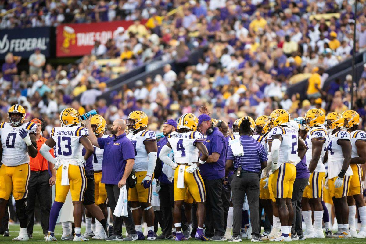 The LSU football team stands together during a timeout on Saturday, Sept. 9, 2023, during LSU&#8217;s 72-10 win over Grambling State at Tiger Stadium in Baton Rouge, La.