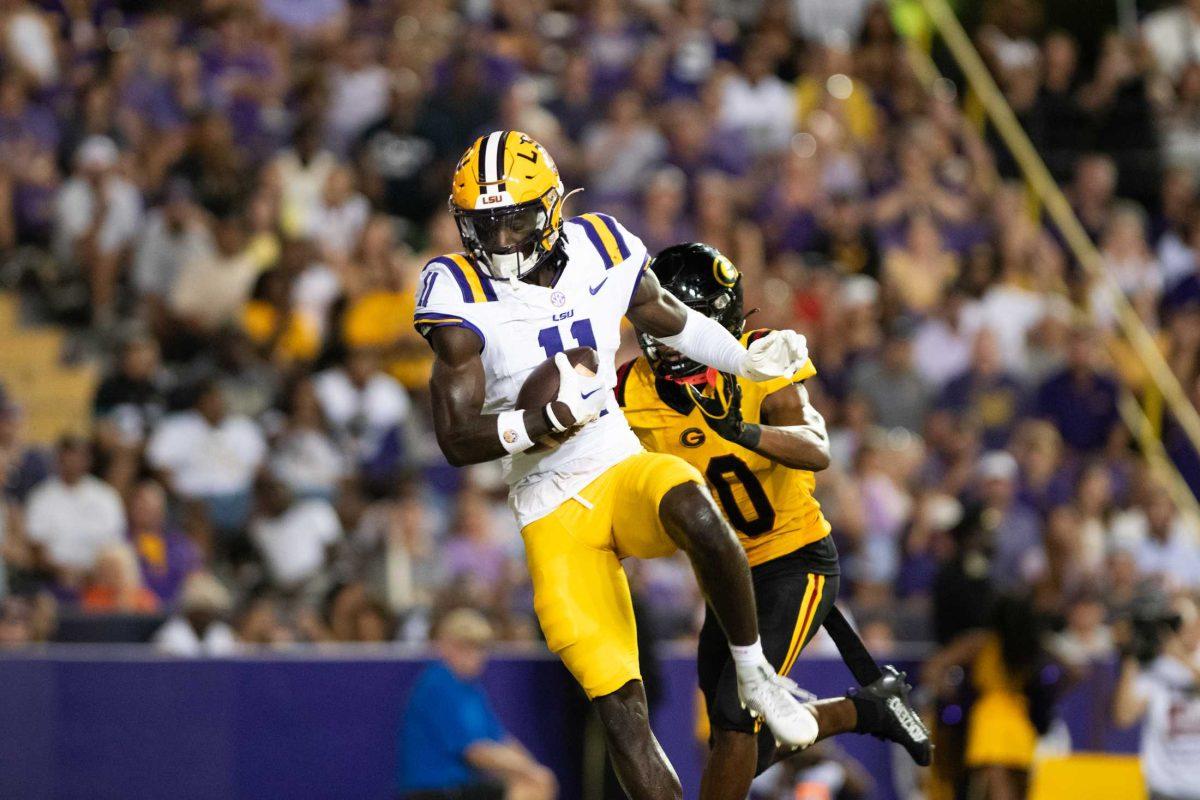 LSU football junior wide receiver Brian Thomas Jr. (11) catches the ball for a touchdown on Saturday, Sept. 9, 2023, during LSU&#8217;s 72-10 win over Grambling State at Tiger Stadium in Baton Rouge, La.