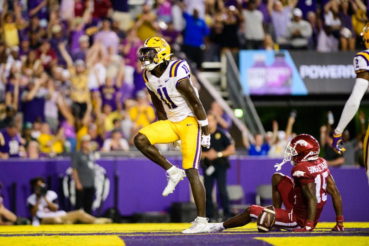 LSU football junior wide reciever Brian Thomas Jr. (11) stomps in celebration on Saturday, Sept. 23, 2023, during LSU's 34-31 victory over Arkansas in Death Valley in Baton Rouge, La.